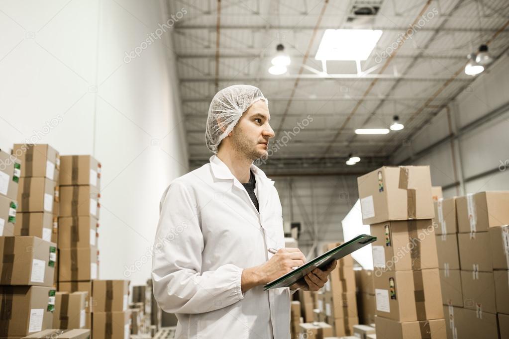 Worker In warehouse for food packaging