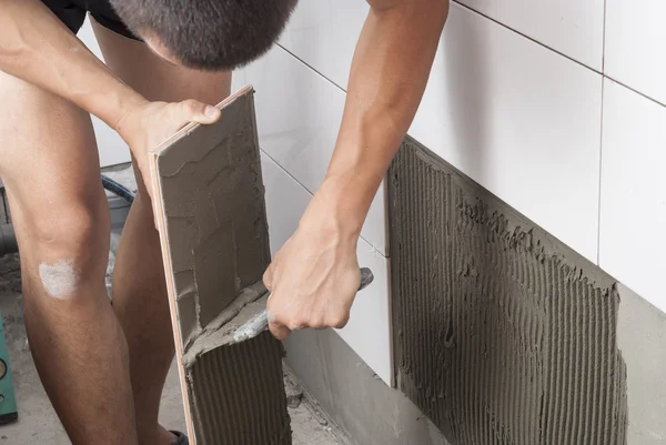 Laying ceramic tiles — Stock Photo, Image