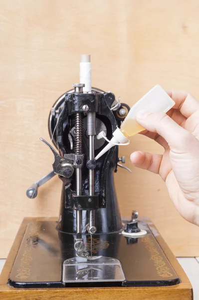 Sewing machine repair — Stock Photo, Image