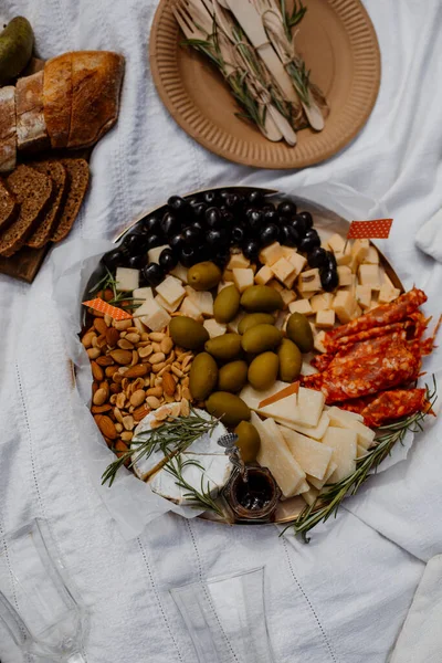 Picnic Snacks White Picnic Blanket Top View Cheese Plate Delicacies Royalty Free Stock Images