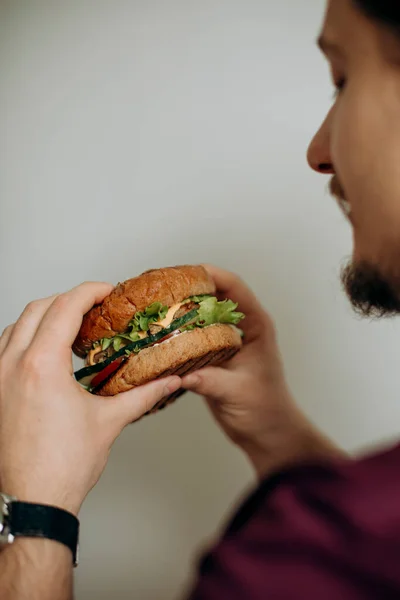 Burger Hands Bearded Young Man Hungry Guy Holds Cheeseburger Eating — Stok Foto