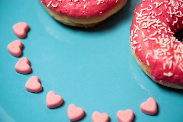 Donut Heart Shaped Icing Blue Background — Photo