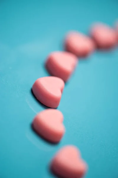 Heart Shaped Pills Blue Background — Photo