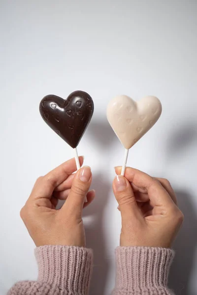 Heart Shaped Chocolate Candy Hands White Background — Photo