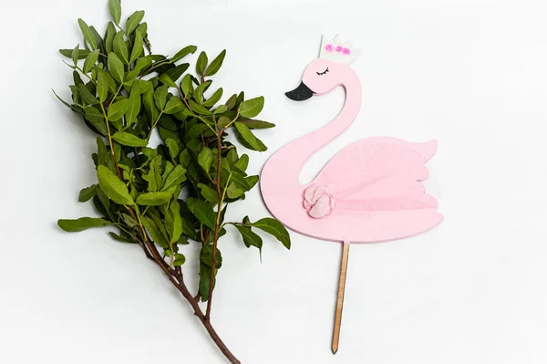 Pink flamingo figurine. Cake topper