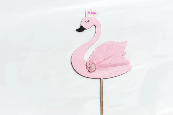 Pink flamingo figurine. Cake topper