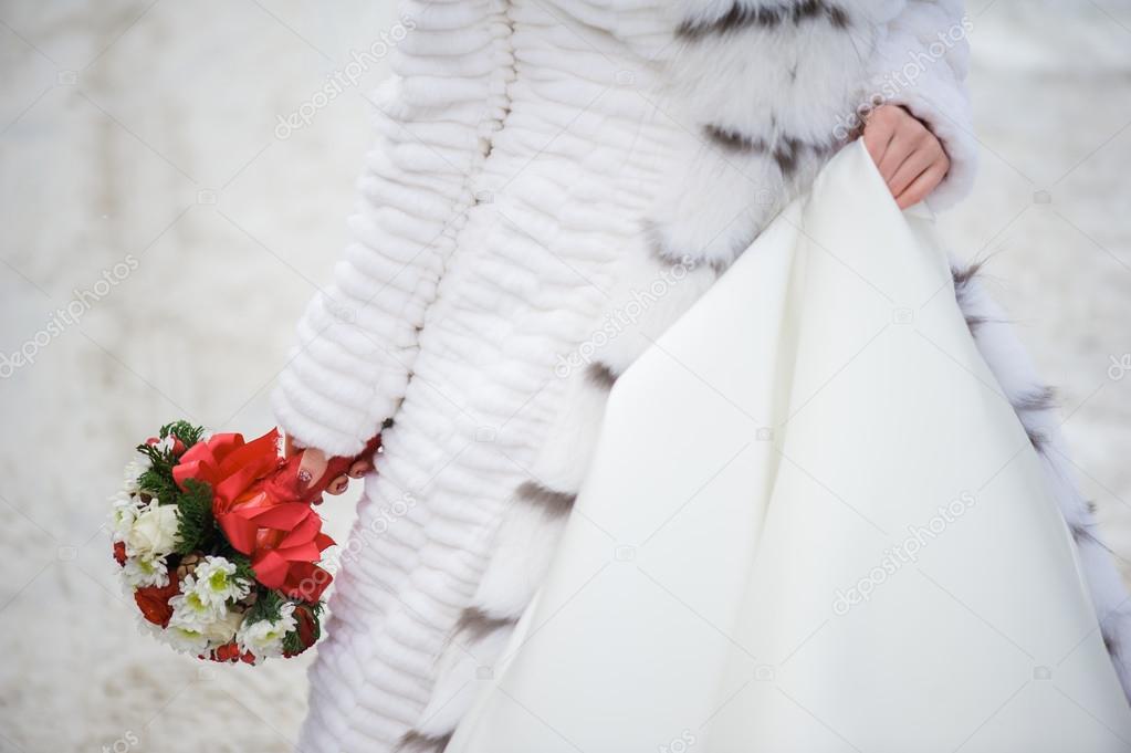 Beautiful bride with bouquet before wedding ceremony