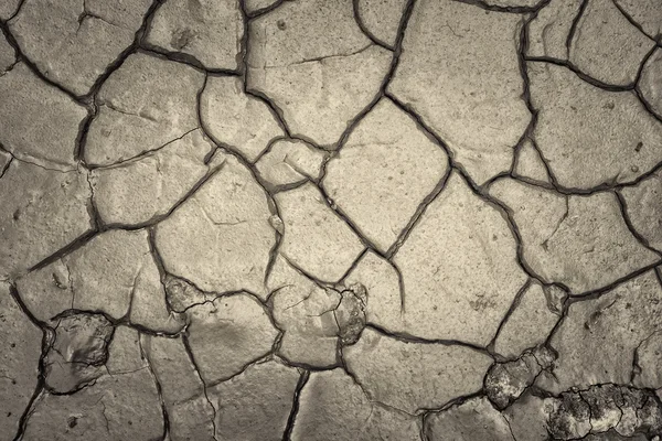 Přistát s suché popraskané země, nedostatku vody sezóny. — Stock fotografie