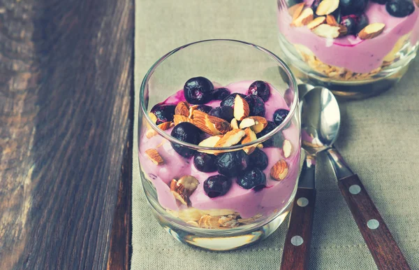 Dessert of oatmeal, banana, yogurt, blueberries and almond