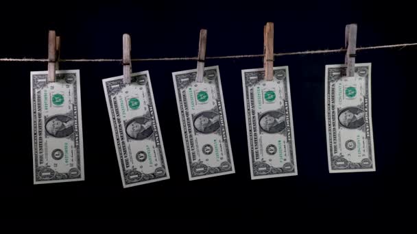 Dollars dry on a clothespin rope — Stock Video