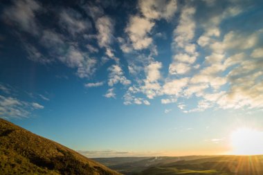 Zirvedeki güneşin doğuşuna hayran kaldım.