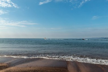 Exmouth Sahili, sabah sular çekilince.