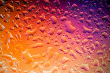 Overflows and bubbles of acrylic paint in liquid, many colors