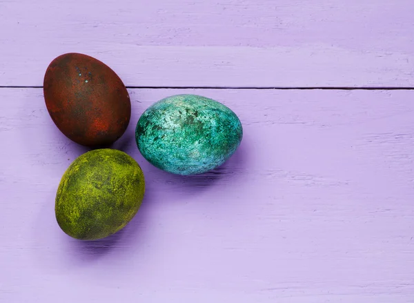 Easter eggs on a wooden table. — Stock Photo, Image