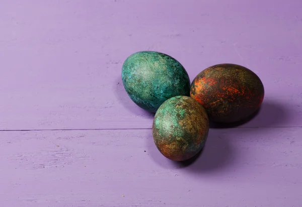 Easter eggs on a wooden table. — Stock Photo, Image