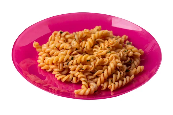 粉红盘上的意大利面 白色底色孤立 番茄酱中的意大利面配上丁香 意大利面顶面视图 — 图库照片