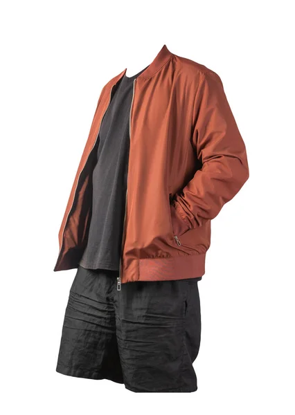 mens red bomber jacket,black t-shirt and black sports shorts isolated on white background. fashionable casual wear