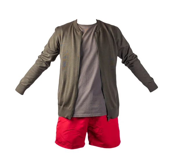 mens dark green bomber jacket,gray t-shirt and red sports shorts isolated on white background. fashionable casual wear