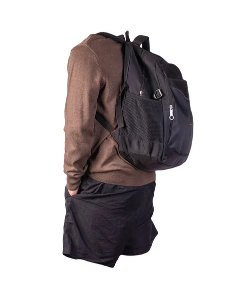 Schwarzer Rucksack Schwarze Shorts Brauner Pullover Auf Weißem Hintergrund Freizeitkleidung — Stockfoto