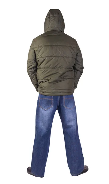ダークブルーのジーンズ ブラックのレザーシューズ フードがホワイトを基調としたダークグリーンのジャケット カジュアルスタイル — ストック写真