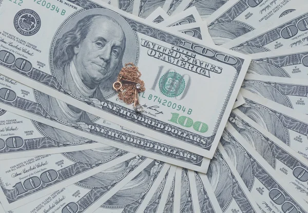 Доллары на белом фоне — стоковое фото