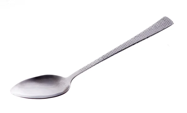 Metal spoon closeup on white background — Stock Photo, Image