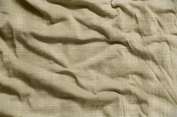 Parlak kahverengi buruşuk kumaş doku. — Stok fotoğraf
