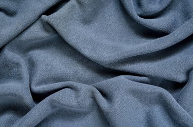 Mavi buruşuk kumaş doku. 