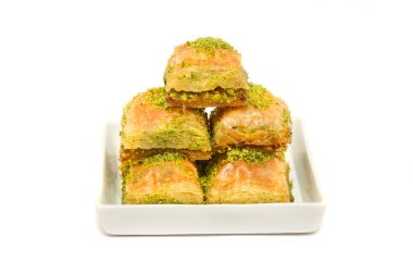 Geleneksel Türk Ramazan tatlısı - şam fıstıklı baklava (Türkçe: fistikli baklava). Bayram mübareği. Ramazan bayrami. Ramazan Kareem.