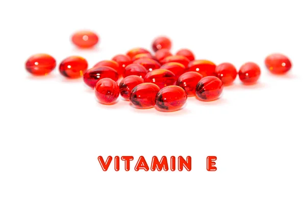Closeup Cápsulas Vermelhas Transparentes Com Vitamina Isolada Fundo Branco — Fotografia de Stock