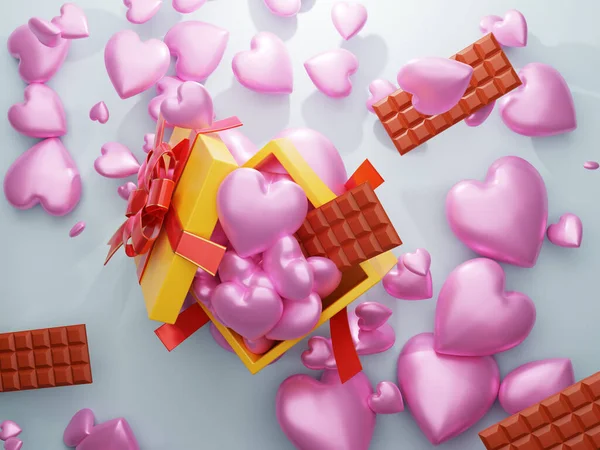 Hediye kutusu çikolata ile pembe kalp düşüyor.