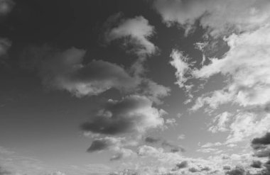Black and white image of a sky panorama with clouds , a dense layer of gray clouds.