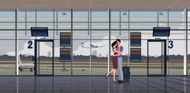 Bir adam ve bir kız havaalanı lobisinde, pencerenin dışında bir uçak manzarasıyla sarılıyorlar..