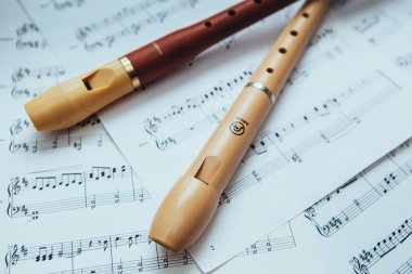 Recorders with music notes clipart