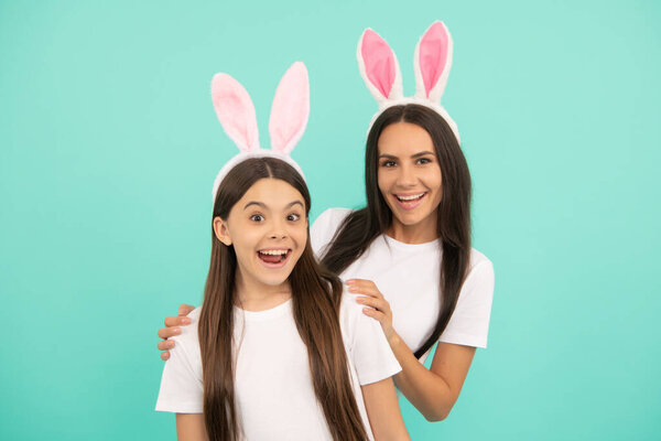 happy easter family of mom and daughter in bunny ears, happy easter.