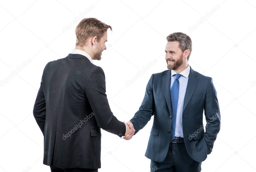 pleasure to deal with you. partners after business deal. cooperation and partnership. handshake of colleagues. successful negotiations. men shaking hands. businessmen on meeting. boss and employee.