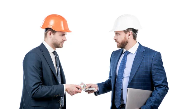 Confident Businesspeople Men Suit Safety Helmet Giving Money Hold Computer — Stock Photo, Image