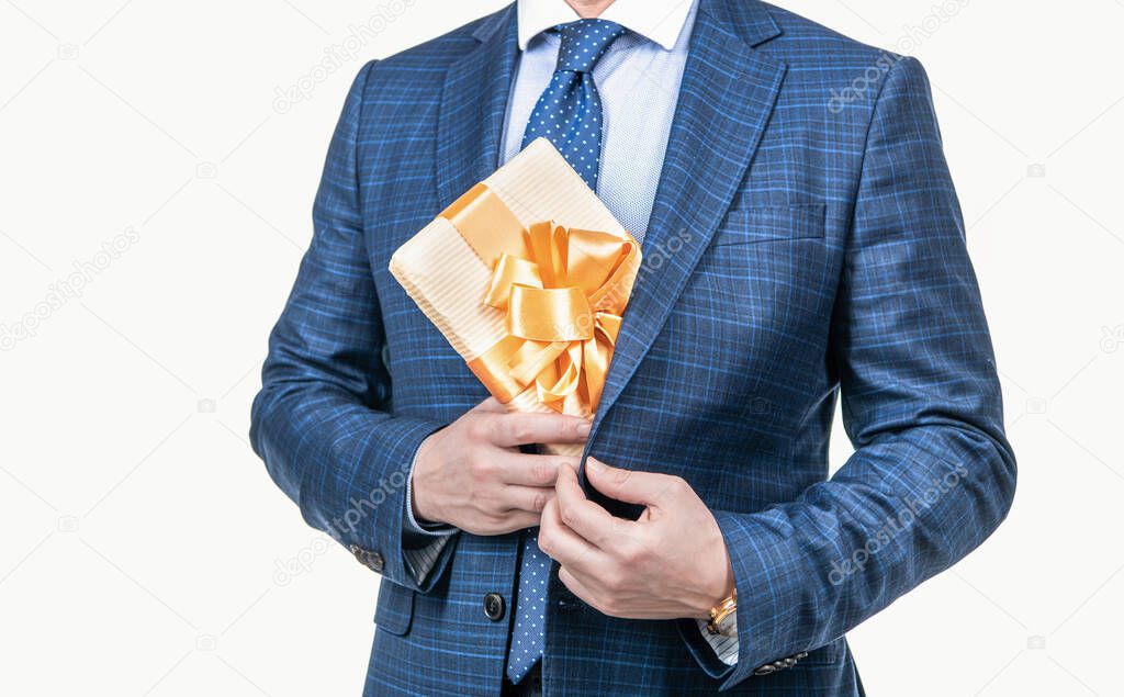 cropped businessman man in businesslike suit holding present box isolated on white, business reward.