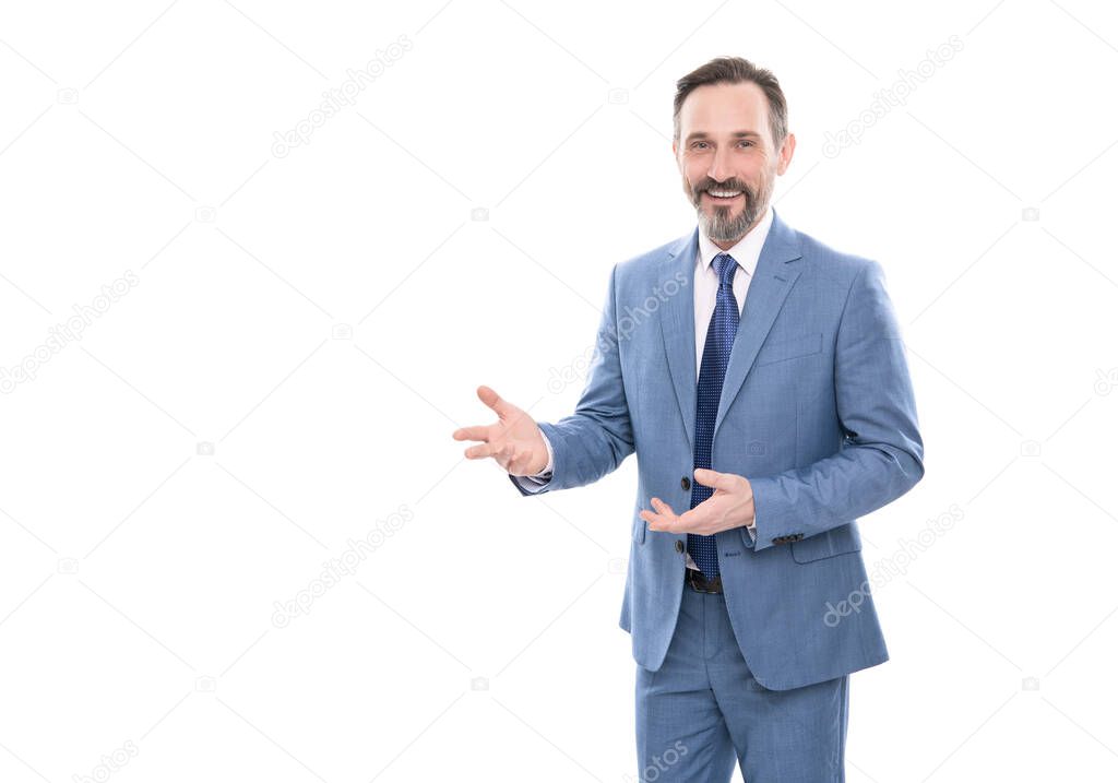 mature businessman in formalwear presenting product. business communication. successful man in businesslike suit. happy smiling entrepreneur. male formal fashion. professional grizzled ceo. copy space