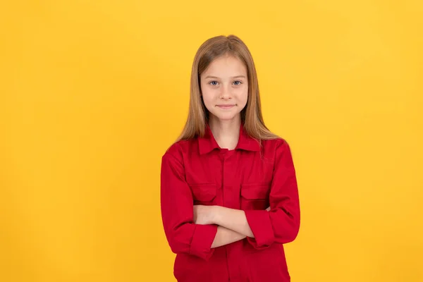 Cheerful kid in red shirt. beauty and fashion. female fashion model. pretty look of young girl — Stock Photo, Image