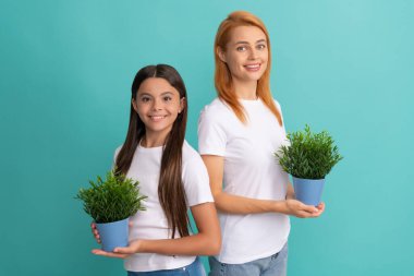 Adoptive family of adopted daugher child and woman mother smile holding pot plants, foster clipart