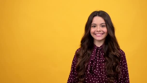 Happy child curly hair with surprised face holding shopping bag, purchase — Stock Video