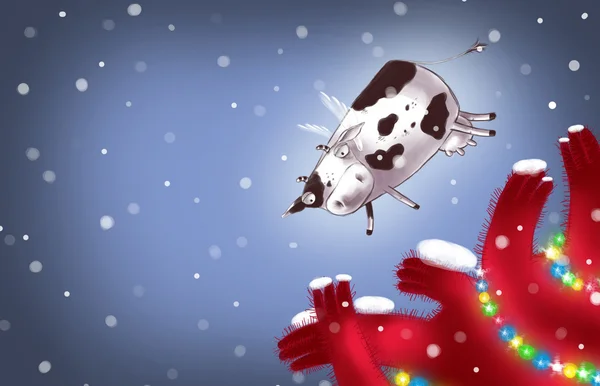 Sevimli uçan inek Noel ağacı üzerinde