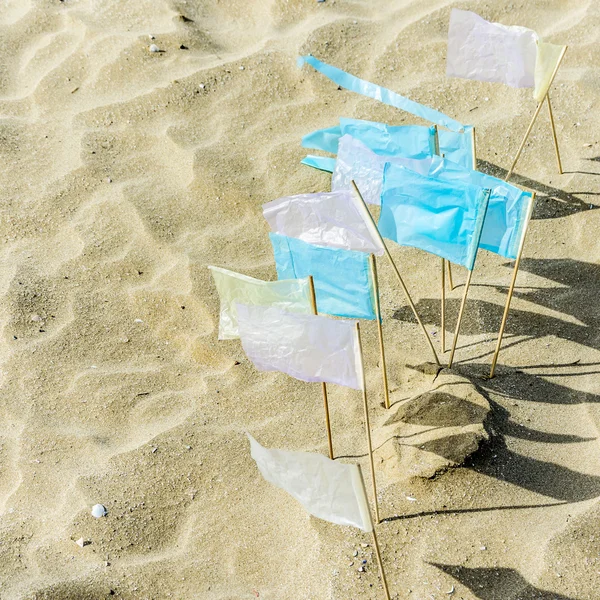 Flags on the beach — Stock Photo, Image