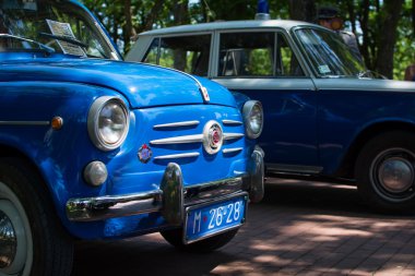 Subotica, Serbia -July 05, 2015. Police car on Annual oldtimer car show Subotica 2015. Various vintage cars and motorcycles.In organization of Oldtimer Club Subotica. Selective focus on badge.