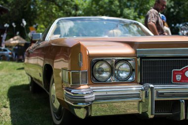 Subotica,Serbia -July 05,2015. XVII Oldtimer gathering Subotica 2015. Various cars and motorcycles. Cadillac Eldorado from 1971. Selective focus.