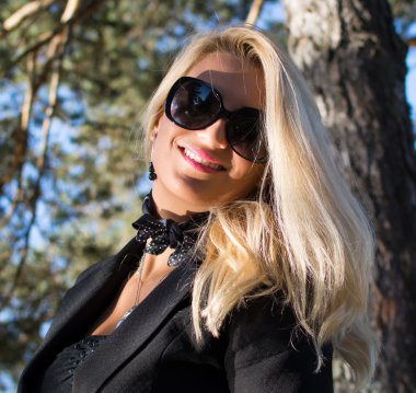 Close-up of a Young attractive sexy woman with beautiful long blond hair.