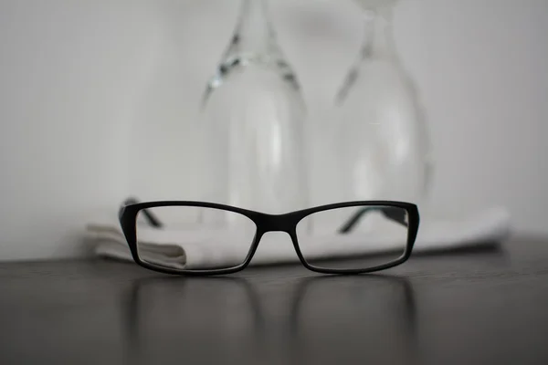 Mans spectacles on a table. — Stock Photo, Image