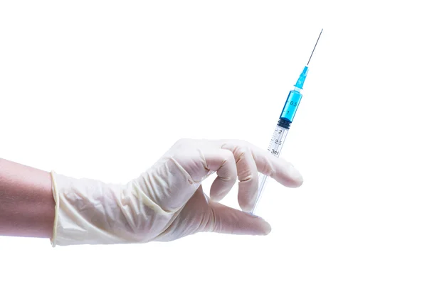 Dentist holding the syringe over the white background — Stock Photo, Image