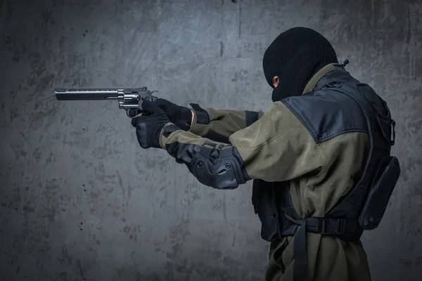 Terrorist in balaclava with big gun rifle in hands — Stock Photo, Image